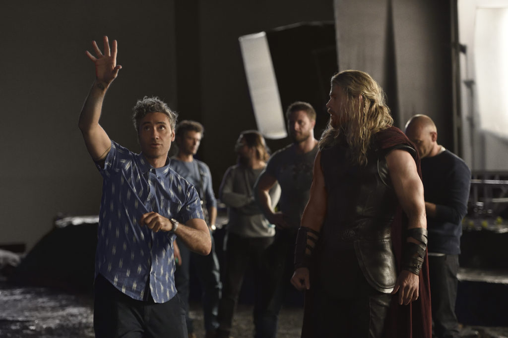 Thor: Ragnarok - (L-R) Director Taika Waititi and Chris Hemsworth. Photo by: Jasin Boland. ©2016 Marvel Studios.