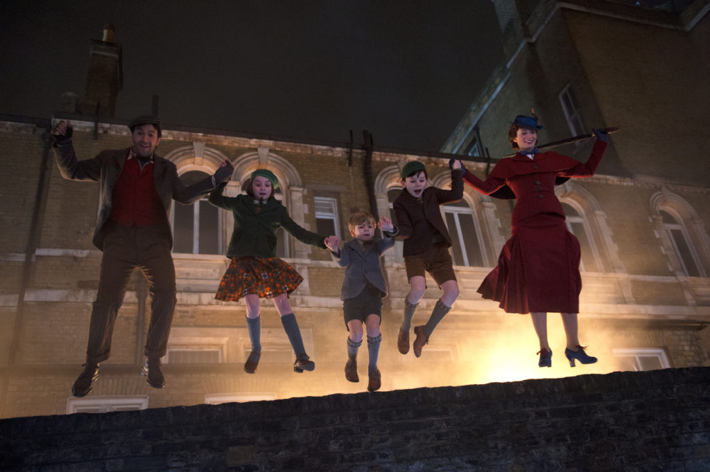 Jack (lin-Manuel Miranda), Annabel (Pixie Davies), Georgie (Joel Dawson), John (Nathanael Saleh) and Mary Poppins (Emily Blunt) in Disney's original musical MARY POPPINS RETURNS, a sequel to the 1964 MARY POPPINS which takes audiences on an entirely new adventure with the practically perfect nanny and the Banks family.